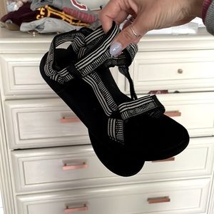Black and white Teva sandles size 7